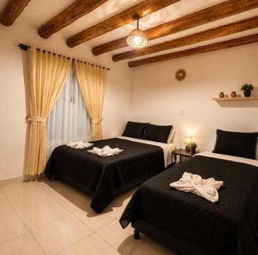 Cabaña familiar con 2 dormitorios y baños privados in Villa de Leyva