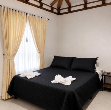 Cabaña familiar con 4 dormitorios y baños privados in Villa de Leyva