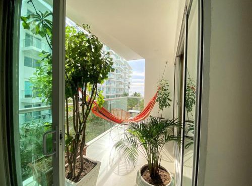 Apartment in Beachfront Building with Resort Pools near Historic Center Cartagena in Cartagena de Indias