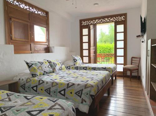 Casa Santa Rita - Habitación Cuadruple in Montenegro