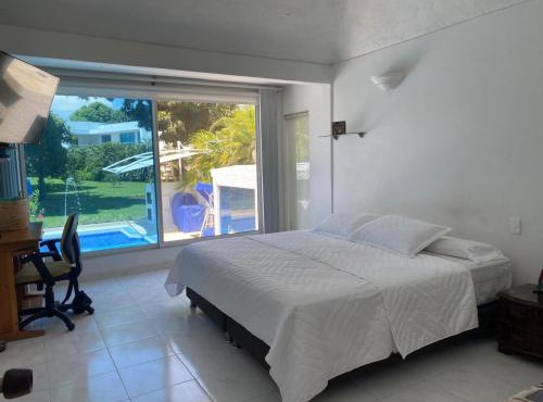 HERMOSA VILLA FAMILIAR CONDOMINIO CAMPESTRE EL PEÑON Piscina Privada Campo de Golf